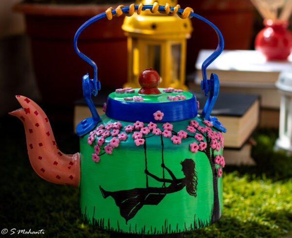 Girl on a swing themed kettle