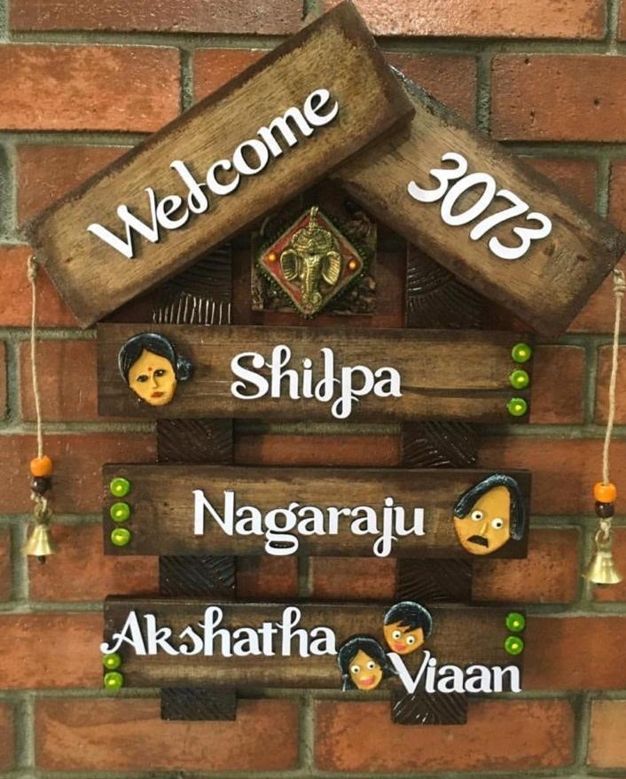 name plate with faces for family house